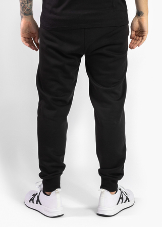 Spodnie dresowe męskie PUMA ESS LOGO PANTS FL CL - Sneaker Peeker